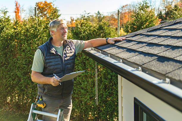 Professional Hail Damage Roof Repair technician working in Rush Valley, UT